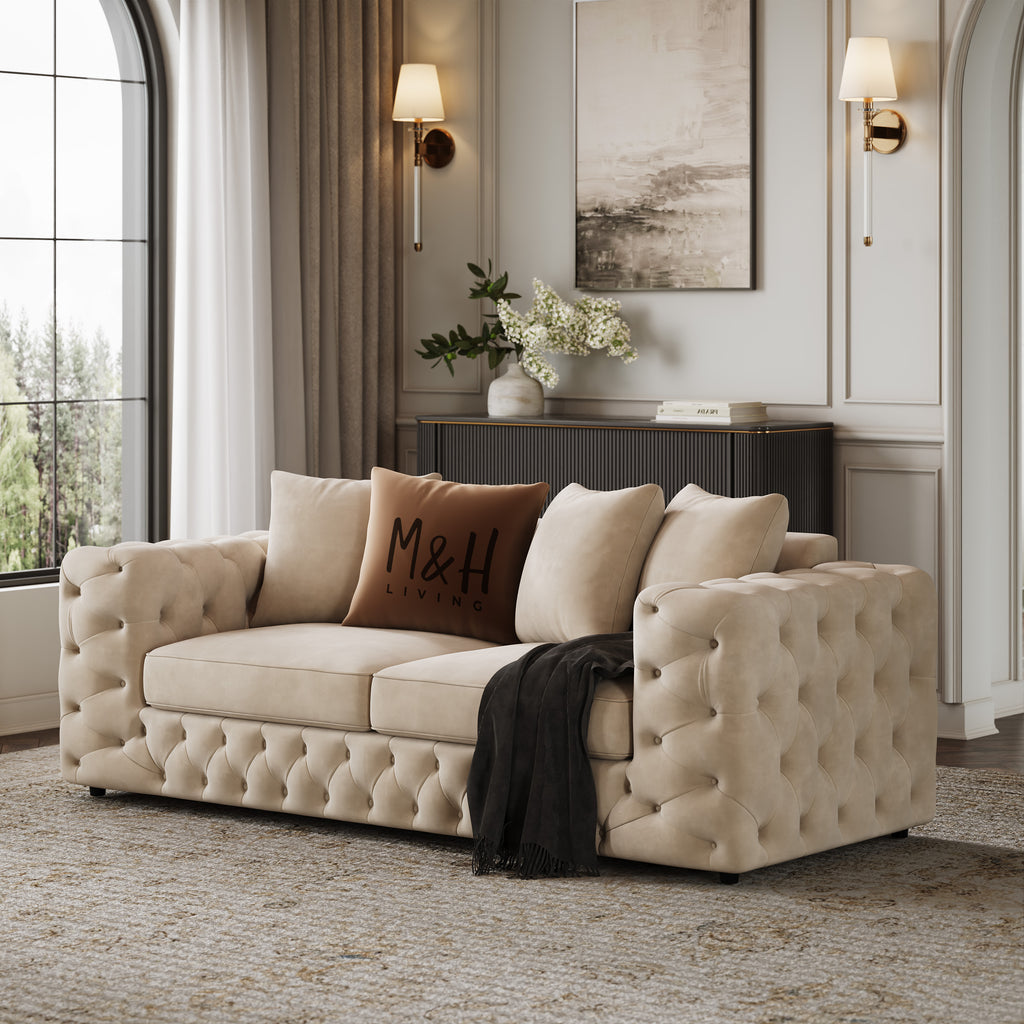 Ashton 2 Seater Sofa shown in plush velvet, angled view in a living room