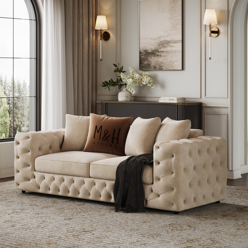 Ashton 2 Seater Sofa shown in plush velvet, angled view in a living room