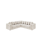 Ashton Corner Sofa shown in plush velvet, view on a plain background