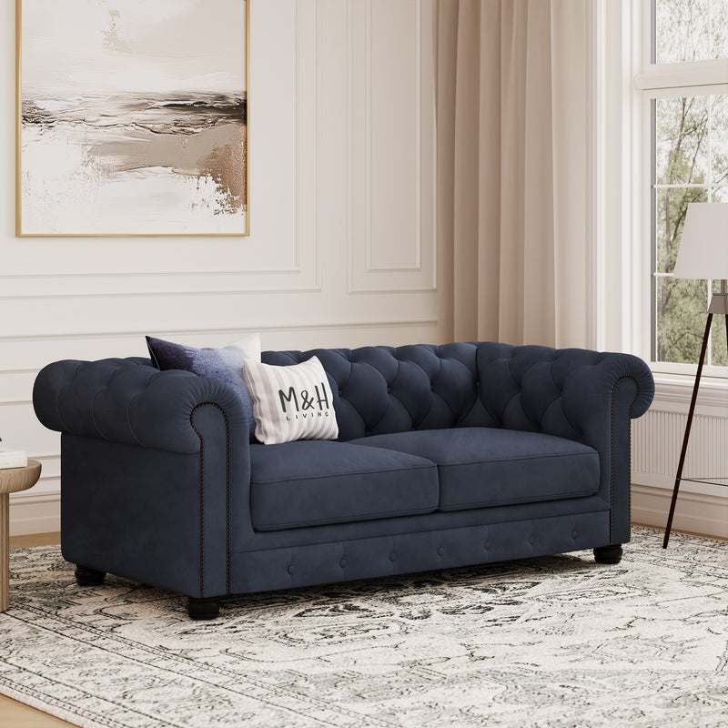 Chelsea Chesterfield 2 Seater Sofa shown in plush velvet, angled view in a living room