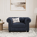 Chelsea Chesterfield Loveseat Sofa shown in plush velvet, front view in a living room