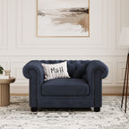 Chelsea Chesterfield Loveseat Sofa shown in plush velvet, front view in a living room