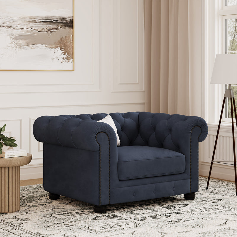 Chelsea Chesterfield Loveseat Sofa shown in plush velvet, angled view in a living room