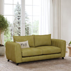 Hazel 2 Seater Sofa shown in plush velvet, angled view in a living room