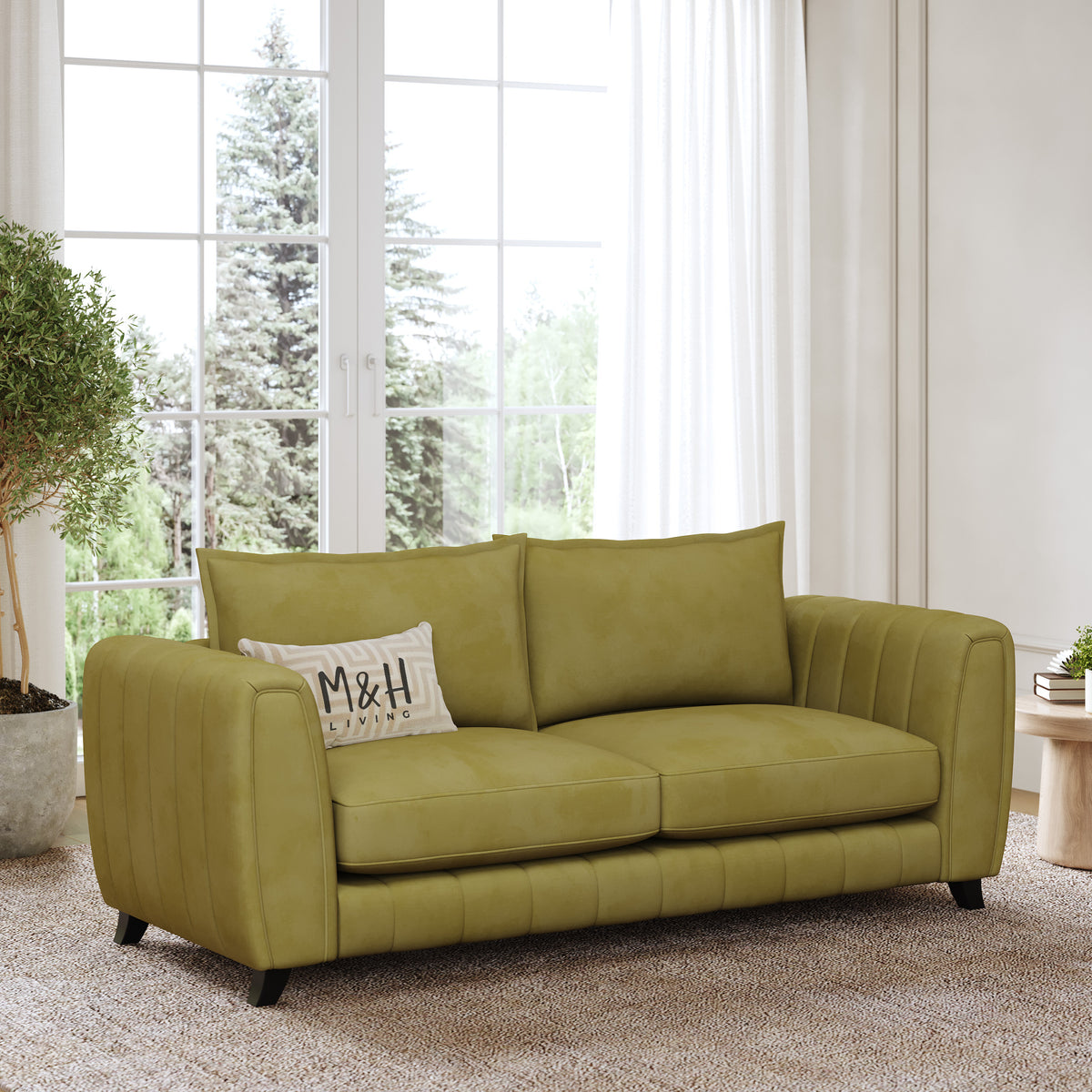 Hazel 2 Seater Sofa shown in plush velvet, angled view in a living room