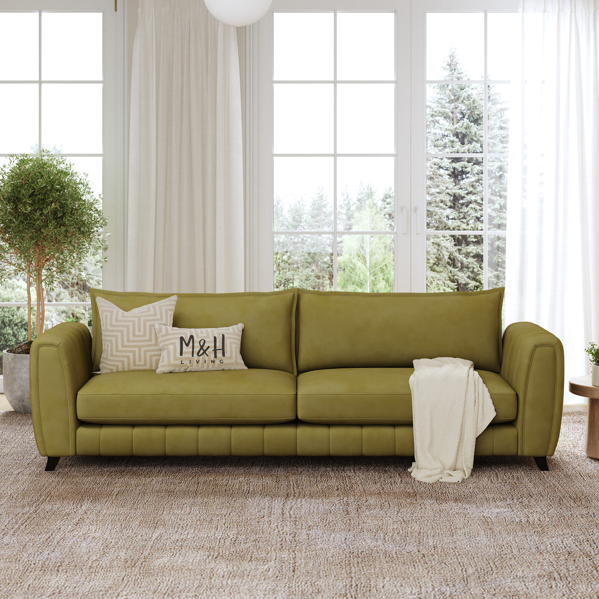 Hazel 4 Seater Sofa shown in plush velvet, front view in a living room