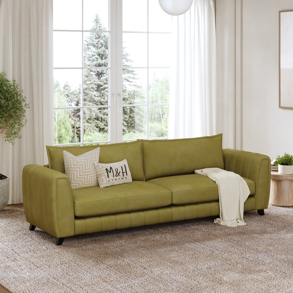 Hazel 3 Seater Sofa shown in plush velvet, angled view in a living room