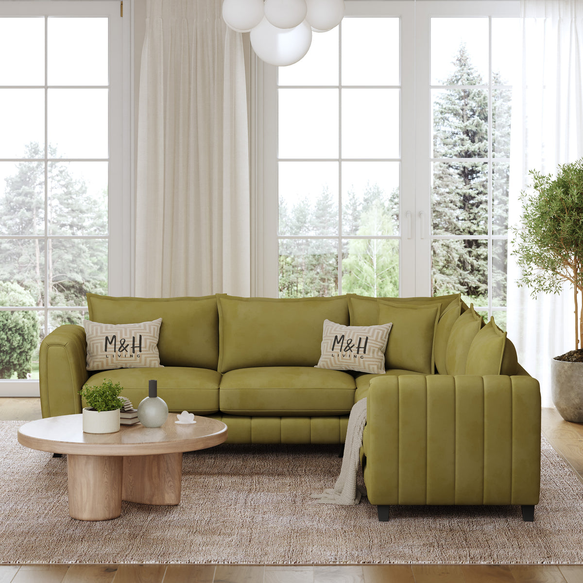 Hazel Corner Sofa shown in plush velvet, front view in a living room
