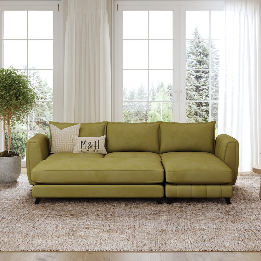 Hazel Convertible L Shape Sofa shown in plush velvet, front view in a living room