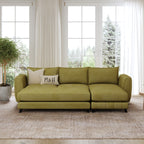 Hazel Convertible L Shape Sofa shown in plush velvet, front view in a living room