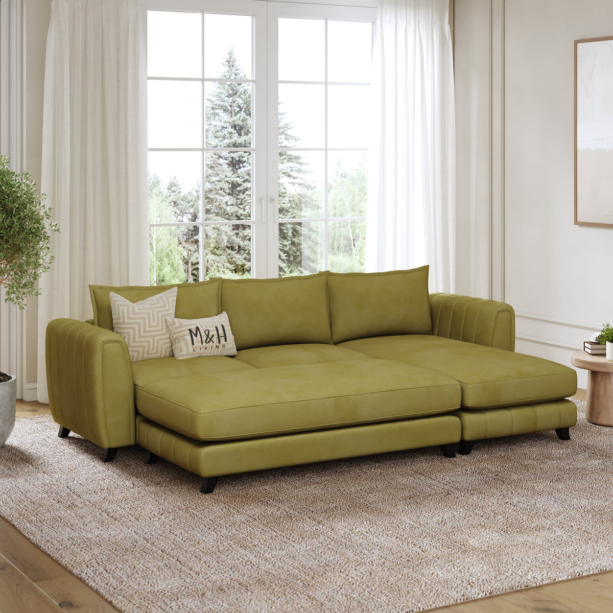 Hazel Convertible L Shape Sofa shown in plush velvet, angled view in a living room