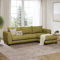 Hazel L Shape Sofa shown in plush velvet, angled view in a living room