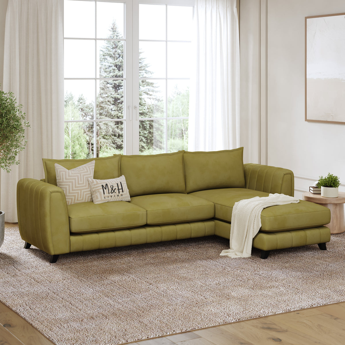 Hazel L Shape Sofa shown in plush velvet, angled view in a living room