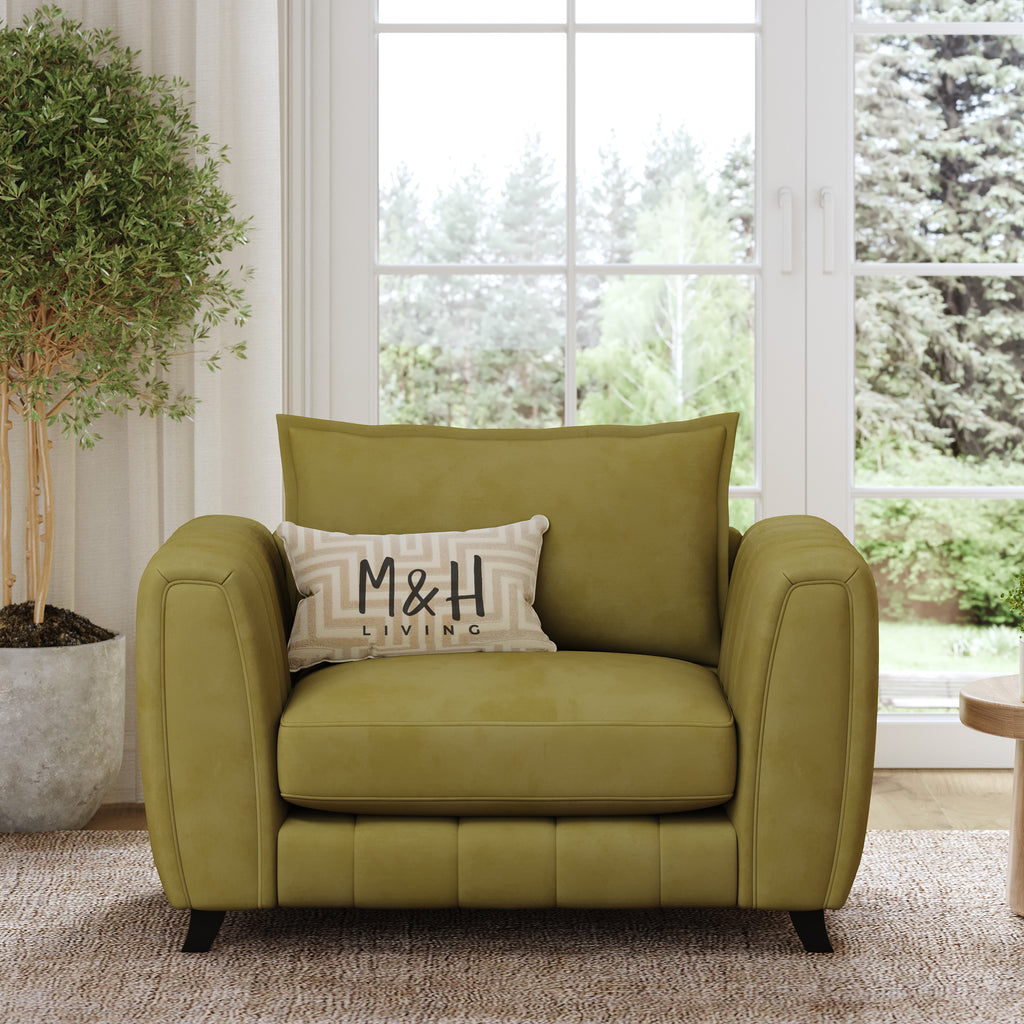 Hazel Loveseat Sofa shown in plush velvet, front view in a living room