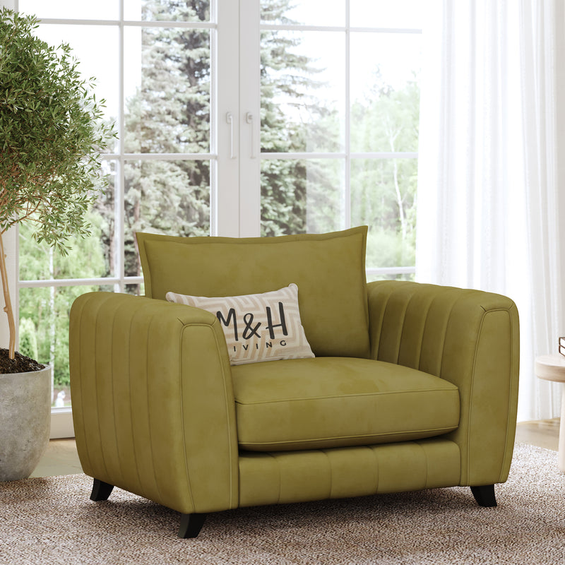 Hazel Loveseat Sofa shown in plush velvet, angled view in a living room