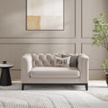 MH Luxury Chesterfield Loveseat Sofa shown in plush velvet, front view in a living room