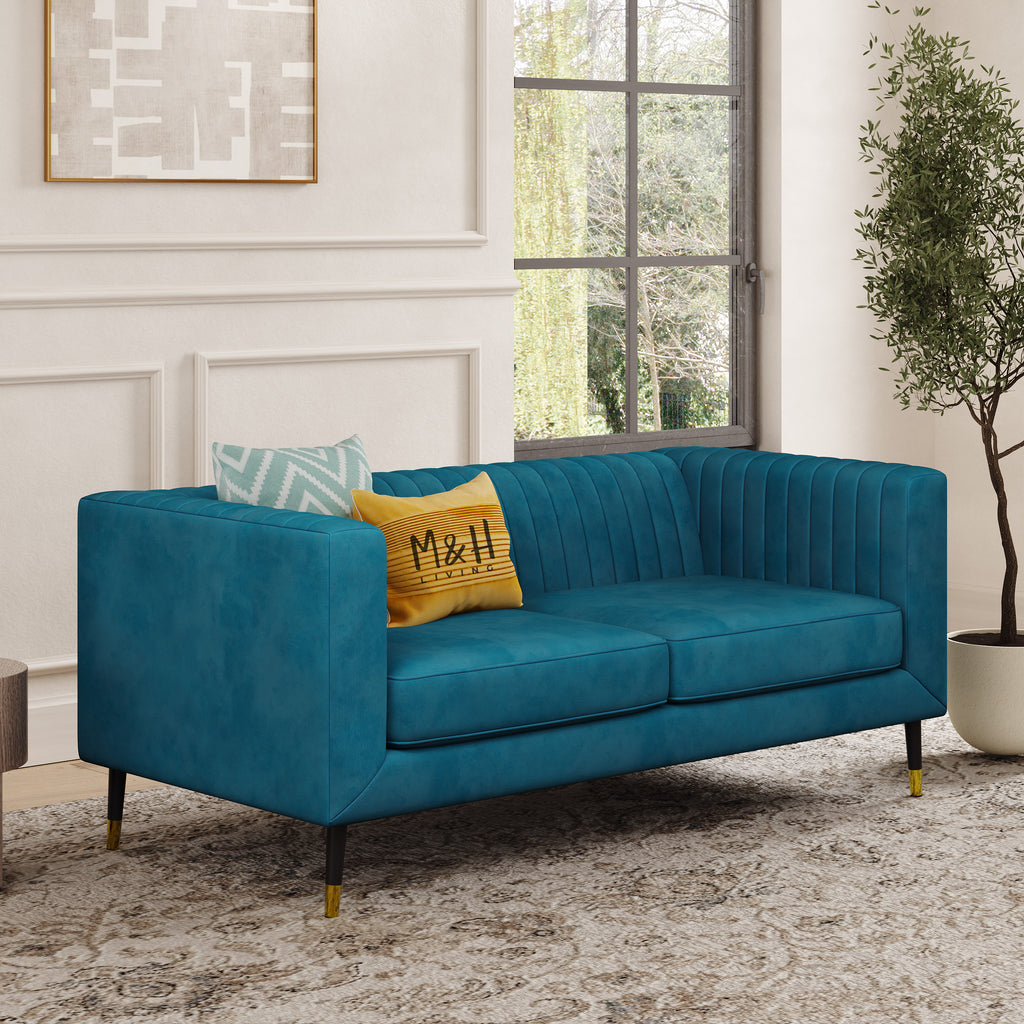 Monroe 2 Seater Sofa shown in plush velvet, angled view in a living room