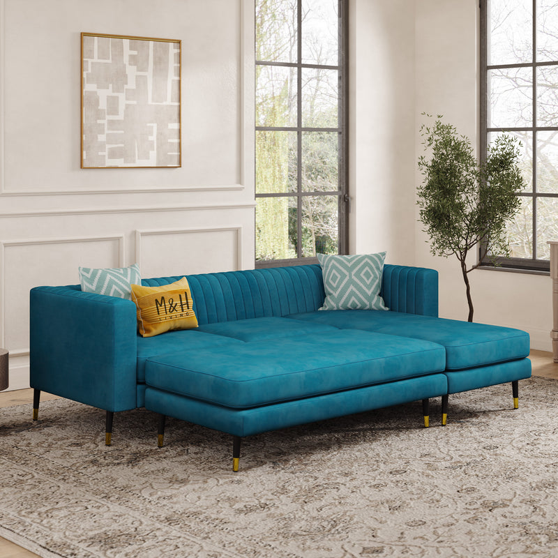 Monroe Convertible L Shape Sofa shown in plush velvet, angled view in a living room