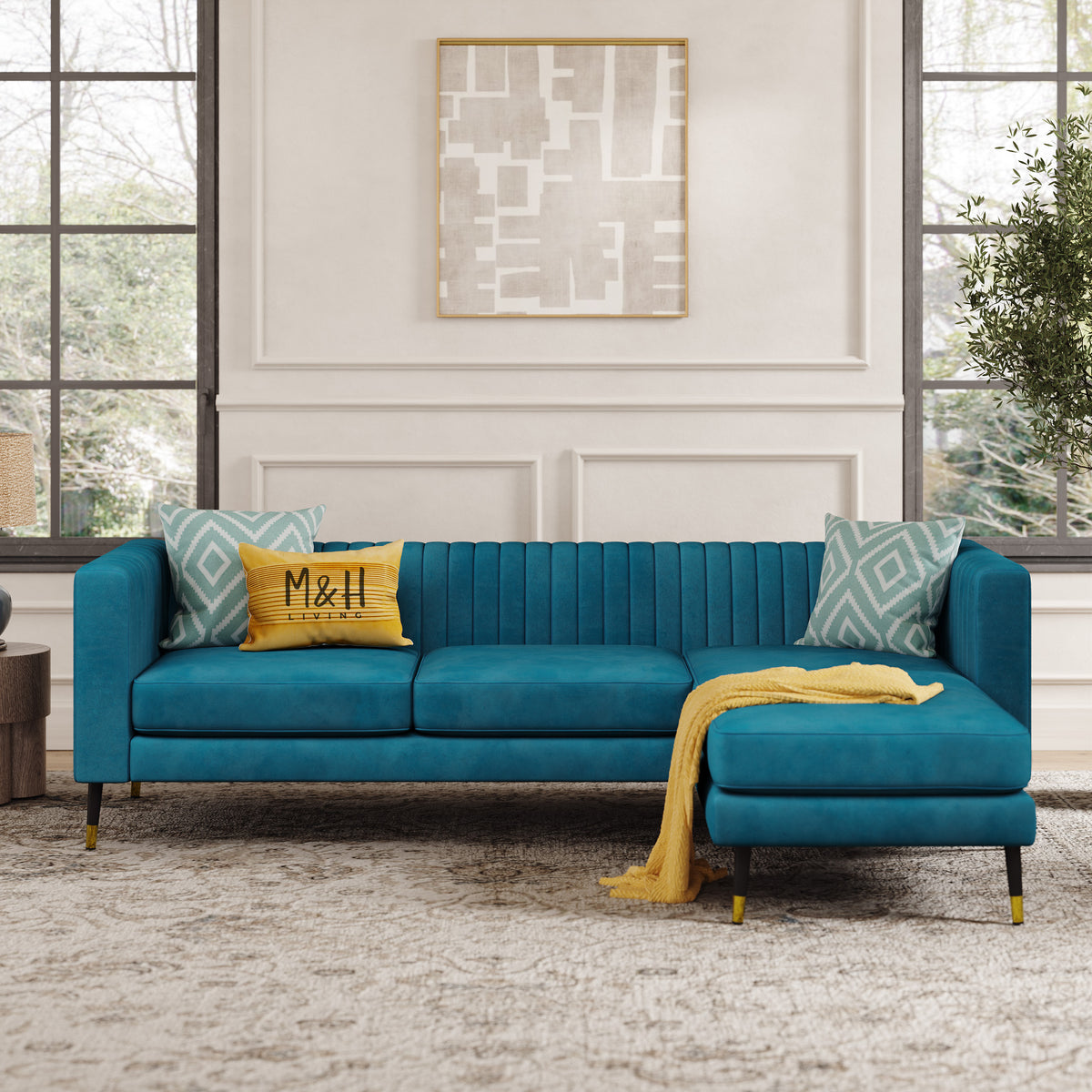 Monroe L Shape Sofa shown in plush velvet, front view in a living room