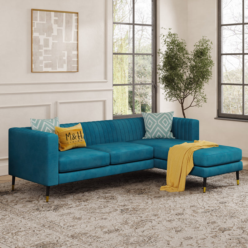 Monroe L Shape Sofa shown in plush velvet, angled view in a living room