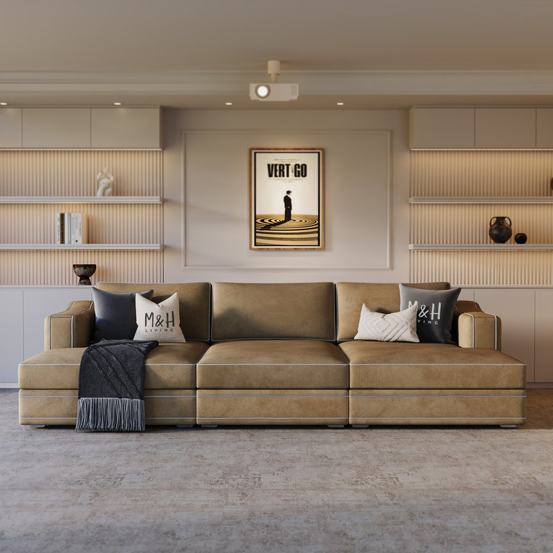 Odeon Home Cinema Sofa shown in plush velvet, front view in a living room
