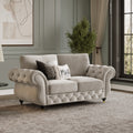 Rio 2 Seater Sofa shown in plush velvet, angled view in a living room