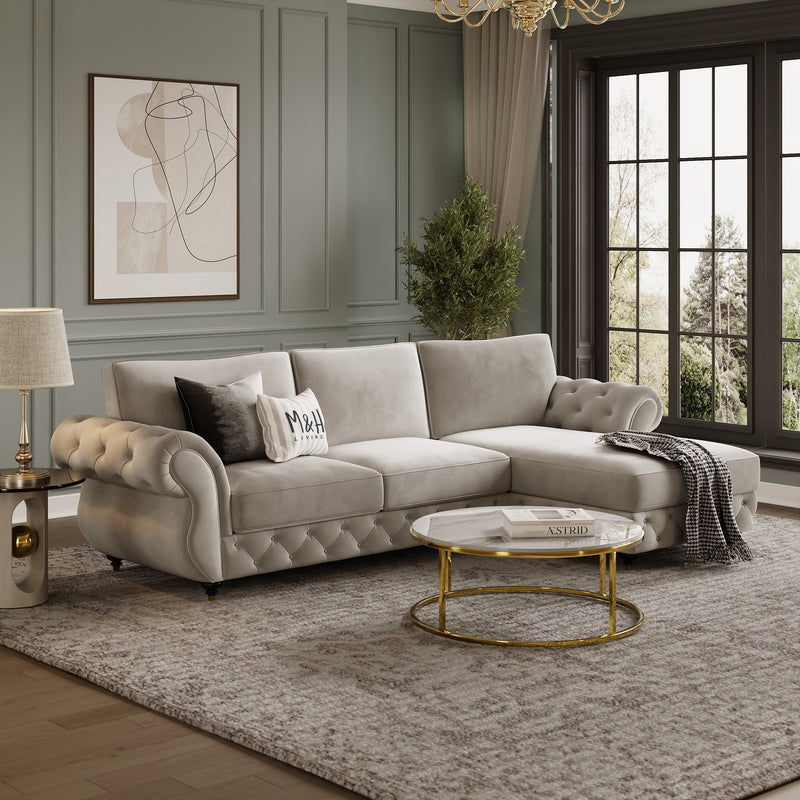 Rio L Shape Sofa shown in plush velvet, angled view in a living room