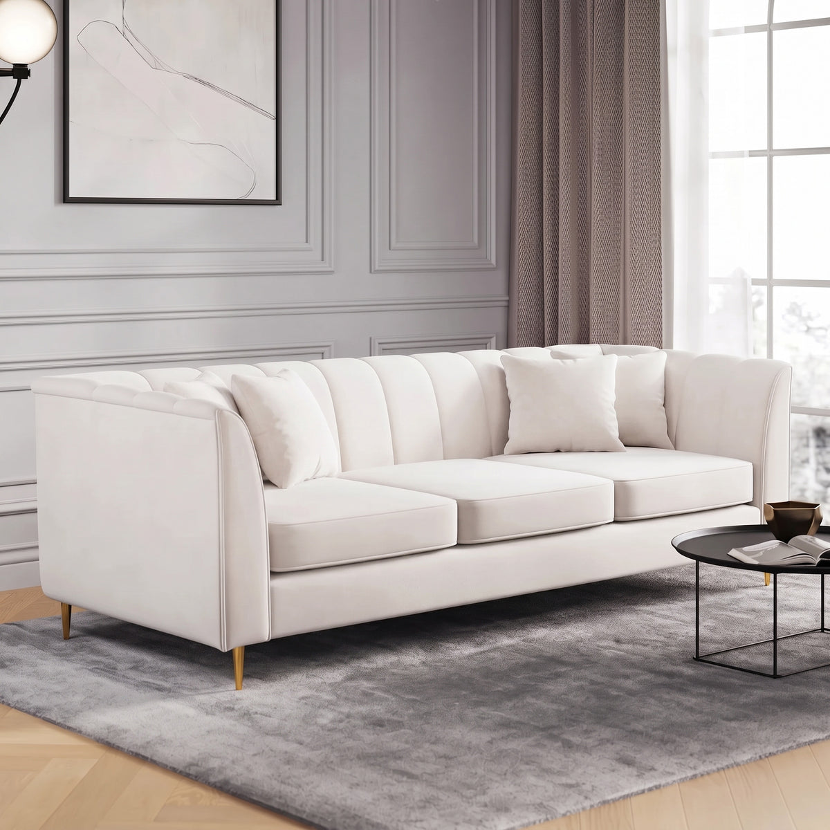 Romeo 3 Seater Sofa shown in cream, angled view in a living room